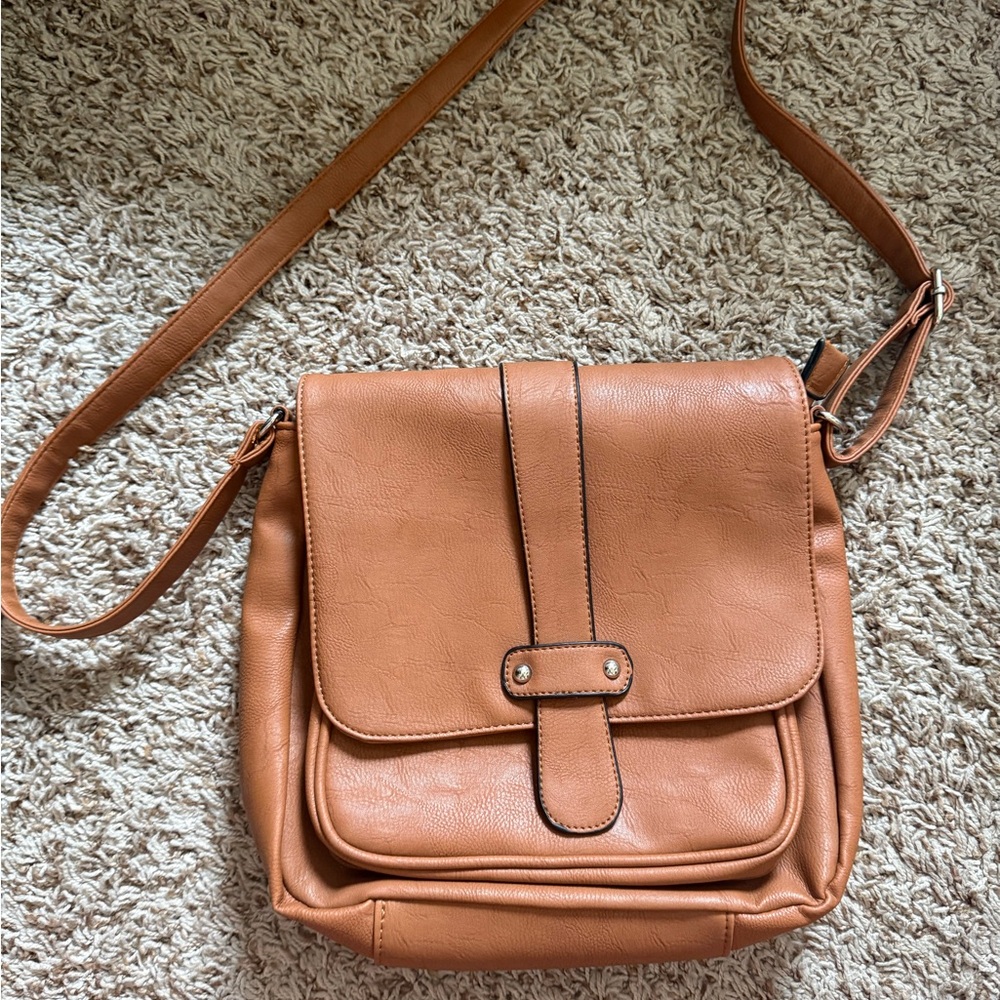 Tan Crossbody Bag with Adjustable Strap and Flap Closure